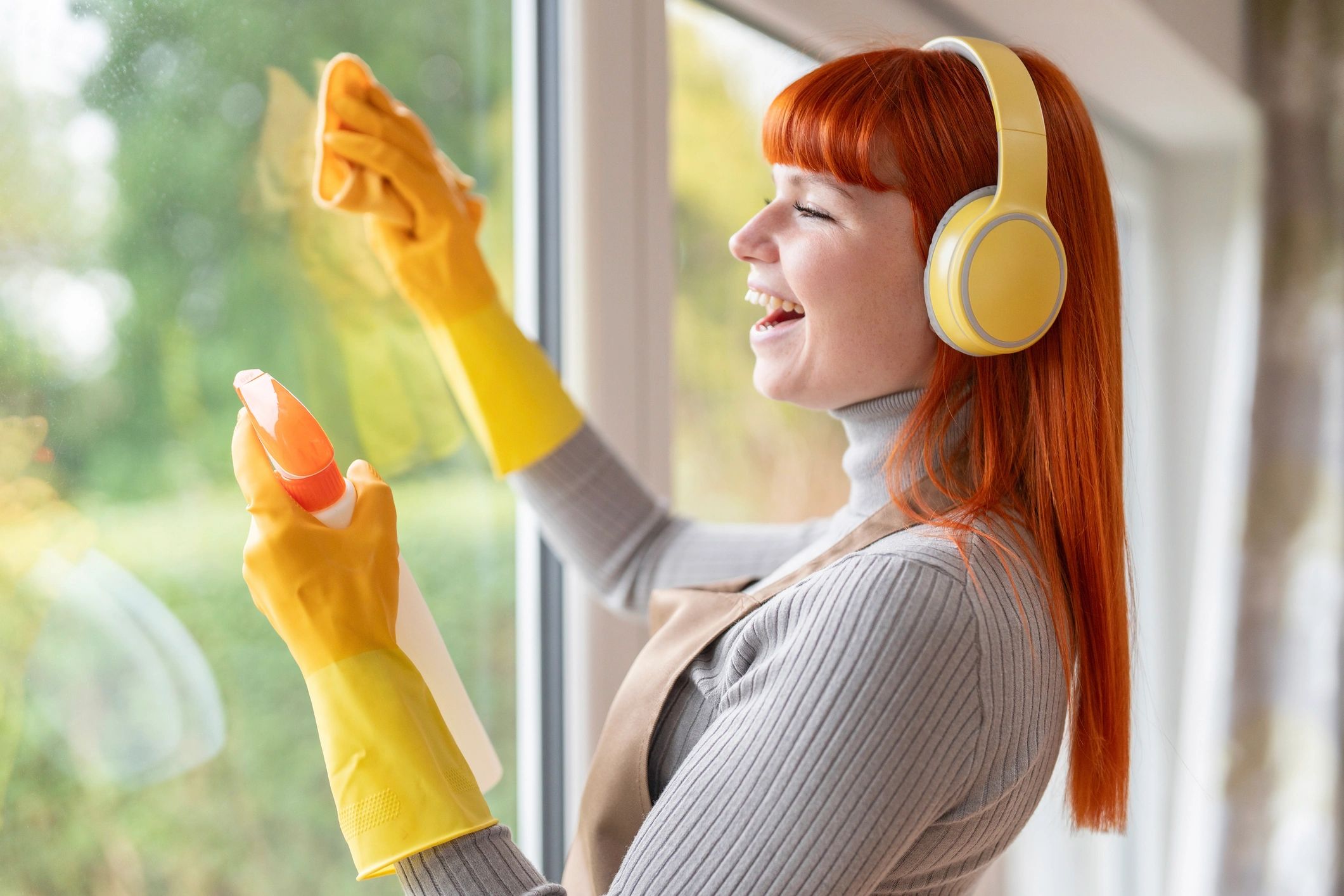 Caucasian woman cleaning home